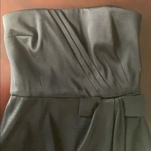Strapless black cocktail dress with bow accent